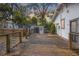 Wooden deck leading to backyard shed with wood railings and fence at 907 Vistabula St, Lakeland, FL 33801