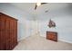 Spare bedroom featuring neutral carpeting and built in storage at 1017 Sawgrass Dr, Winter Haven, FL 33884