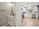 Stylish half-bathroom with modern fixtures and a view to the kitchen at 1018 Roberta Rd, Lake Wales, FL 33853