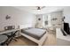 Cozy bedroom with neutral color scheme and a desk area at 1018 Roberta Rd, Lake Wales, FL 33853