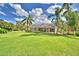 Large yard and screened lanai, perfect for outdoor living at 105 Wyndham Dr, Winter Haven, FL 33884