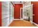 Spacious home office features built-in bookshelves, natural light, and access to outdoor living space at 105 Wyndham Dr, Winter Haven, FL 33884
