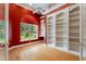 Office space with built-in shelving, natural light, and a cozy, inviting ambiance at 105 Wyndham Dr, Winter Haven, FL 33884