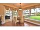 Charming breakfast nook with views of the pool, lake, and manicured backyard at 105 Wyndham Dr, Winter Haven, FL 33884