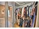 Walk-in closet providing ample storage space for clothing and accessories at 105 Wyndham Dr, Winter Haven, FL 33884