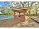 Charming gazebo providing a shaded gathering spot near the tennis courts at 105 Wyndham Dr, Winter Haven, FL 33884
