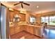 Modern kitchen with stainless steel appliances, granite countertops, custom cabinets and a breakfast nook at 105 Wyndham Dr, Winter Haven, FL 33884