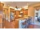 Well-equipped kitchen with stainless steel appliances, granite countertops, and a breakfast bar at 105 Wyndham Dr, Winter Haven, FL 33884
