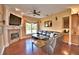 Comfortable living room featuring a fireplace and a view of the front yard at 105 Wyndham Dr, Winter Haven, FL 33884