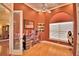 Bright office/playroom features hardwood floors and bright accent walls at 105 Wyndham Dr, Winter Haven, FL 33884