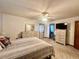 Bedroom with a neutral color scheme and carpet flooring at 1050 E Eagle Ave, Eagle Lake, FL 33839