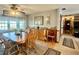 Dining area with wood table, wood chairs, and built-in serving area at 1050 E Eagle Ave, Eagle Lake, FL 33839