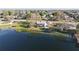 Waterfront home with lake views, a screened porch, and expansive backyard at 1050 E Eagle Ave, Eagle Lake, FL 33839