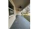 Covered patio with ceiling fans at 1205 Lake Loop Rd, Winter Haven, FL 33880