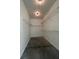 Spacious walk-in closet featuring wire shelving and a neutral color scheme at 1205 Lake Loop Rd, Winter Haven, FL 33880