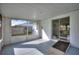 Bright sunroom with sliding glass doors and ample light, perfect for relaxing and enjoying the outdoors at 1229 Rawls Dr, Lakeland, FL 33801