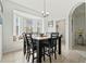 Bright dining area featuring a bay window and neutral decor at 126 Seneca Ln, Davenport, FL 33897