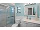 Bathroom with a glass shower, toilet, and vanity with ample lighting at 128 Lake Ring Dr, Winter Haven, FL 33884