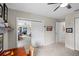 Spacious room with sliding door, closet, and TV, offering plenty of storage and entertainment at 128 Lake Ring Dr, Winter Haven, FL 33884