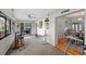 Bright living area with natural light, access to outdoor spaces, and neutral decor at 128 Lake Ring Dr, Winter Haven, FL 33884