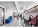 Spacious basement home gym with multiple pieces of equipment and tile flooring at 15 Casarena Ct, Winter Haven, FL 33881