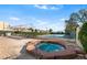 Community hot tub and outdoor seating near the tennis courts at 15 Casarena Ct, Winter Haven, FL 33881
