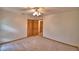 Bedroom with neutral carpeting features dual closets and plenty of natural light at 151 W Hamlin Trl, Frostproof, FL 33843