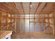 Inside the shed, find a metal interior with wooden supports and shelves for organized storage solutions at 151 W Hamlin Trl, Frostproof, FL 33843