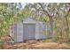 Durable outdoor shed with double doors for easy access and secure storage at 151 W Hamlin Trl, Frostproof, FL 33843