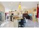 Modern kitchen featuring granite countertops, white cabinetry, and stainless steel appliances at 1621 Normandy Heights Blvd, Winter Haven, FL 33880