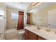Full bathroom with a shower-tub combination and a large mirror at 1904 Eloise Cove Dr, Winter Haven, FL 33884