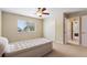 Bright bedroom with closet space and a view to the backyard at 1904 Eloise Cove Dr, Winter Haven, FL 33884