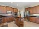 Beautiful kitchen with stainless steel appliances, center island, and ample cabinet space at 1904 Eloise Cove Dr, Winter Haven, FL 33884