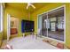 Screened lanai with tiled floor, ceiling fan, furniture, and sliding glass doors at 1904 Eloise Cove Dr, Winter Haven, FL 33884