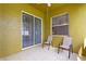 Screened lanai featuring tiled floor, ceiling fan, patio chairs, and sliding glass doors at 1904 Eloise Cove Dr, Winter Haven, FL 33884