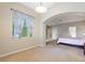 Spacious bedroom showcasing an archway and bright window at 1904 Eloise Cove Dr, Winter Haven, FL 33884