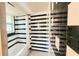 Bathroom featuring stylish black and white tiling, bathtub, and shower at 201 Dr J A Wiltshire W Ave, Lake Wales, FL 33853