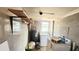 Utility room with washer, dryer, water heater, and ample space at 201 Dr J A Wiltshire W Ave, Lake Wales, FL 33853