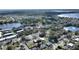 Aerial view of the property highlighting its proximity to multiple lakes and residential areas at 208 Country Ne Ln # 208, Winter Haven, FL 33881