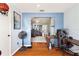 Home office with hardwood flooring, natural light, and stylish desk at 208 Country Ne Ln # 208, Winter Haven, FL 33881