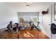 Bedroom with hardwood flooring, natural light, and neutral tones at 208 Country Ne Ln # 208, Winter Haven, FL 33881