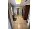 Bonus room with tile floors can be used as office space and showcases built in hutch for storage at 229 Durrell Rd, Winter Haven, FL 33884