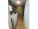 Laundry room with newer washer and dryer, along with storage and built in sink at 229 Durrell Rd, Winter Haven, FL 33884