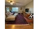 Inviting living room with hardwood floors, plush seating, and a decorative rug at 229 Durrell Rd, Winter Haven, FL 33884
