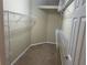Walk-in closet featuring ample white shelving for storage and organization at 2673 Rutledge Ct, Winter Haven, FL 33884