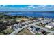Aerial view of waterfront community with lake views and mature trees at 2706 Rochelle Dr, Winter Haven, FL 33881