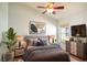 Serene bedroom featuring a plush bed, modern nightstands, and a window providing natural light and garden views at 2706 Rochelle Dr, Winter Haven, FL 33881