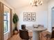 Bright dining room with modern chandelier, table with chairs, and natural light at 2706 Rochelle Dr, Winter Haven, FL 33881