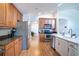 Bright kitchen features stainless steel appliances and wood cabinets at 2706 Rochelle Dr, Winter Haven, FL 33881