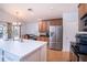 Bright kitchen with stainless steel appliances and a view of the backyard at 2706 Rochelle Dr, Winter Haven, FL 33881